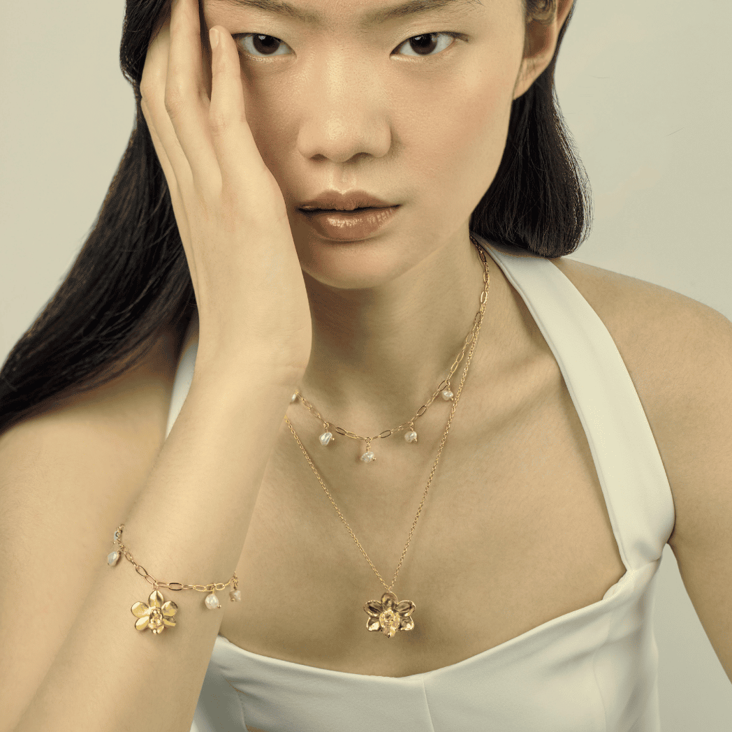 RISIS Layered Orchid Necklace in 24K Gold with Keshi Pearls and Orchid Paperclip Bracelet in 24K Gold with Keshi Pearls