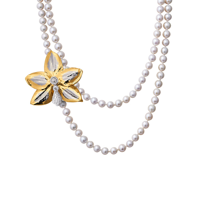 Multi-strand pearl necklace with orchid flower clasp/brooch, gold and silver accents