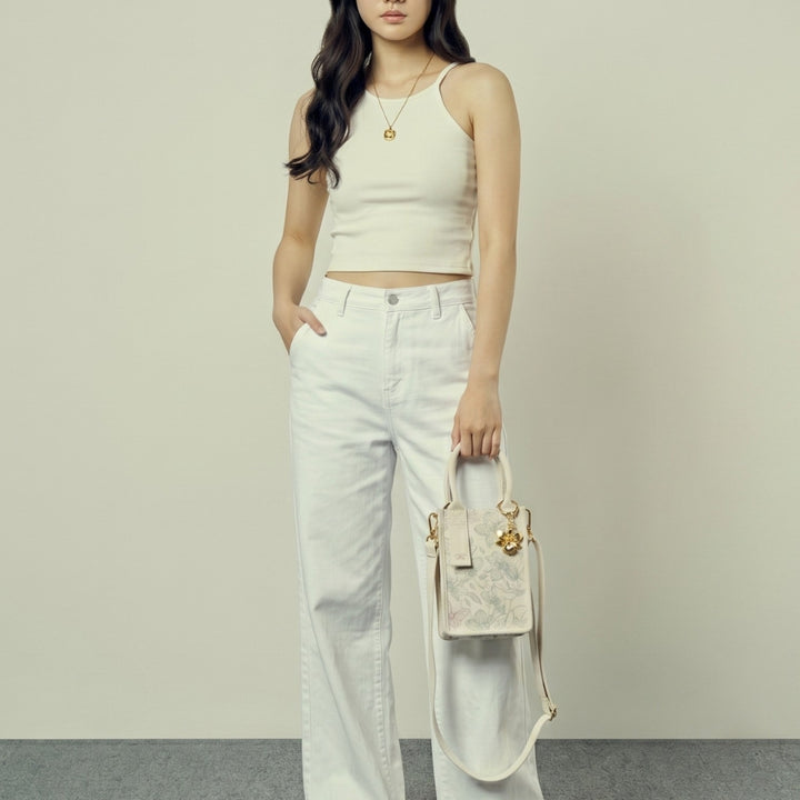 RISIS Orchid canvas mini tote bag carried as a handheld top handle bag