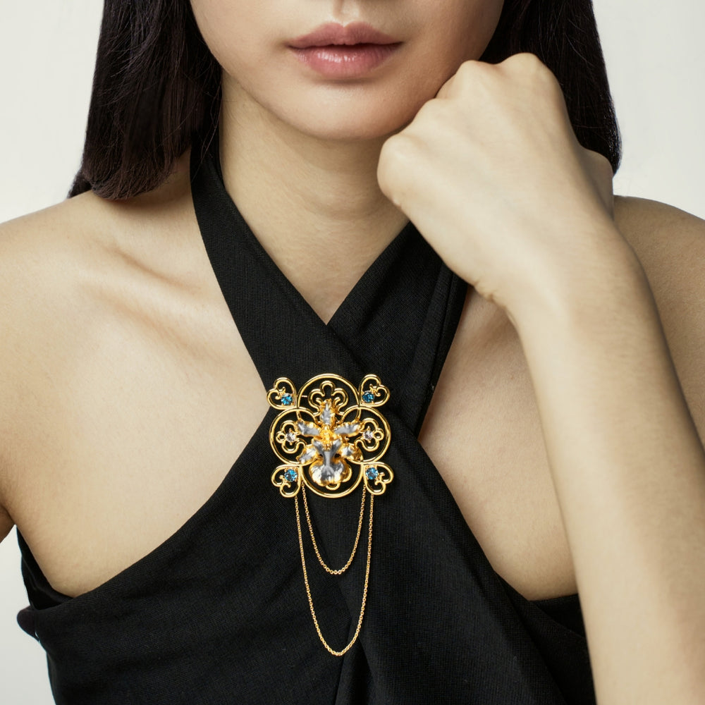 RISIS Peranakan Oncidium Orchid Brooch in Gold and Palladium with White and Blue Topaz