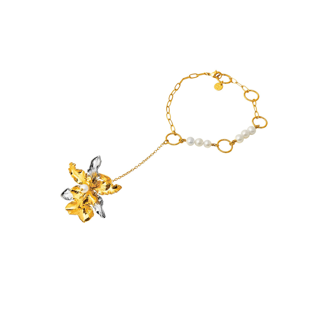 RISIS Ruby Orchid Hand Chain, Natural Burrageara Guann Shin Rouge Ruby Orchid encapsulated in 24K Swiss Gold and Palladium with Freshwater Pearls