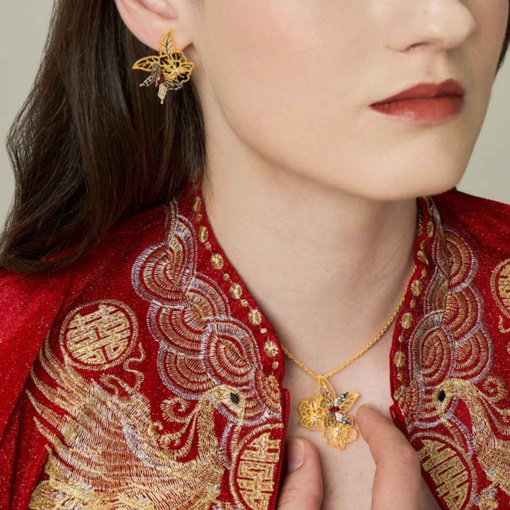 RISIS Scarlet Veil Earrings and Necklace In Gold, encapsulated in 18K Gold and Rhodium with White Topaz and Red Garnet
