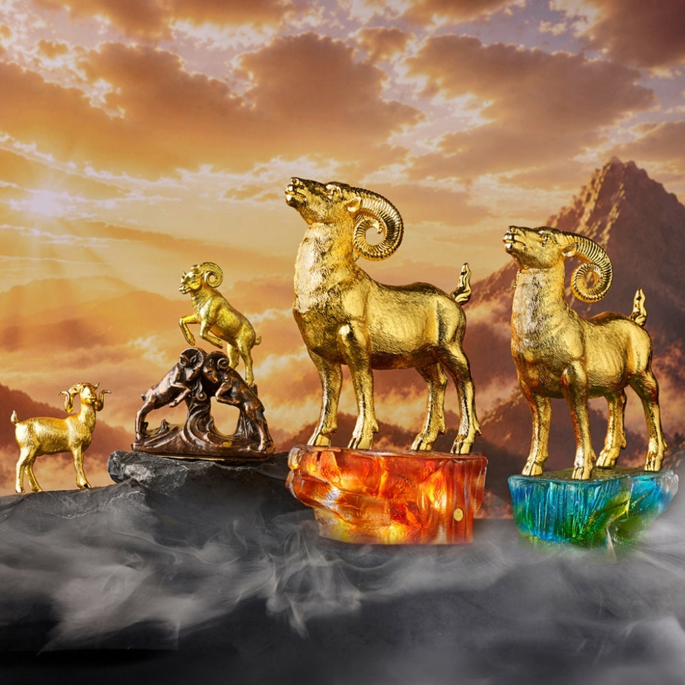 RISIS The Rising Argali (Majestic Goat) in 24K Gold, on Green & amber Liu Li; The Triumvirate Seal Goat in 24K gold; Joyful Herald Goat in 24K Gold