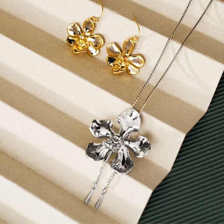 RISIS Kawagara Orchid Long Slider Necklace in Palladium, Doritaenopsis Pulcherima Orchid Earrings in 24K Gold