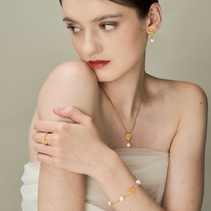 RISIS Vanda Whispers Earrings, Necklace, Bracelet and Ring, encapsulated in 18K Gold with Freshwater Pearls