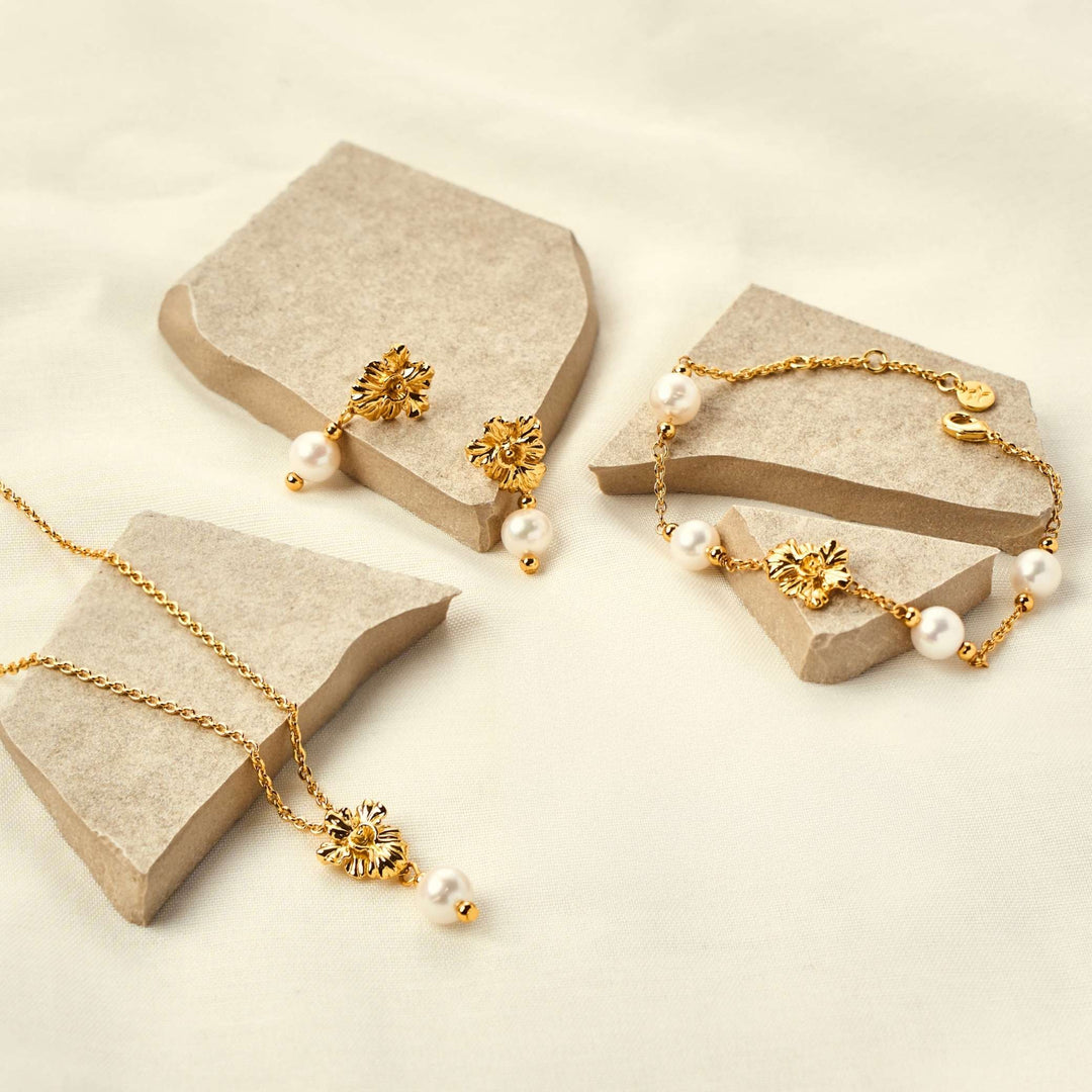 RISIS Vanda Whispers Jewellery Set (Necklace, Earrings, Bracelet & Ring), encapsulated in 18K Gold with Freshwater Pearls