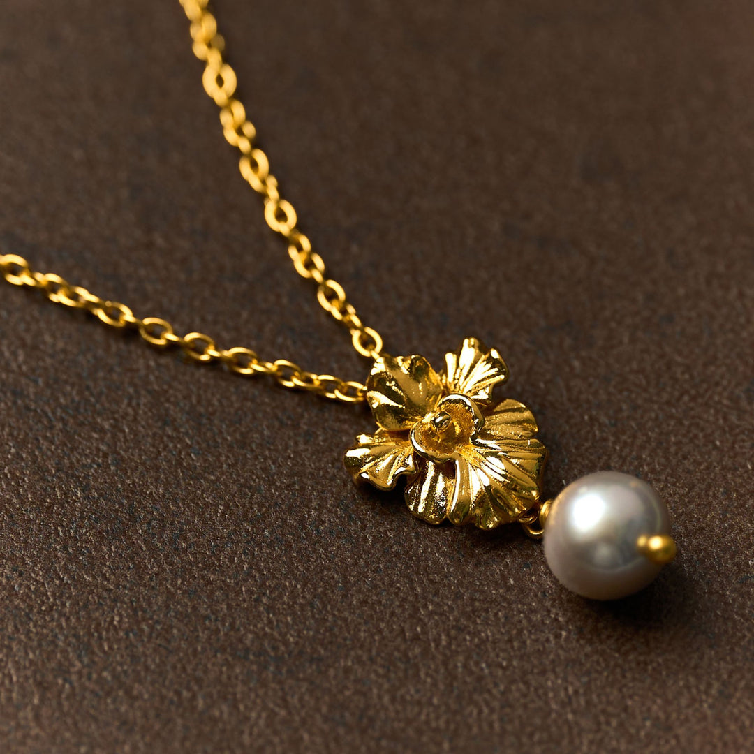 RISIS Vanda Whispers Necklace, Encapsulated in 24K Swiss Gold with Rich Grey Freshwater Pearls