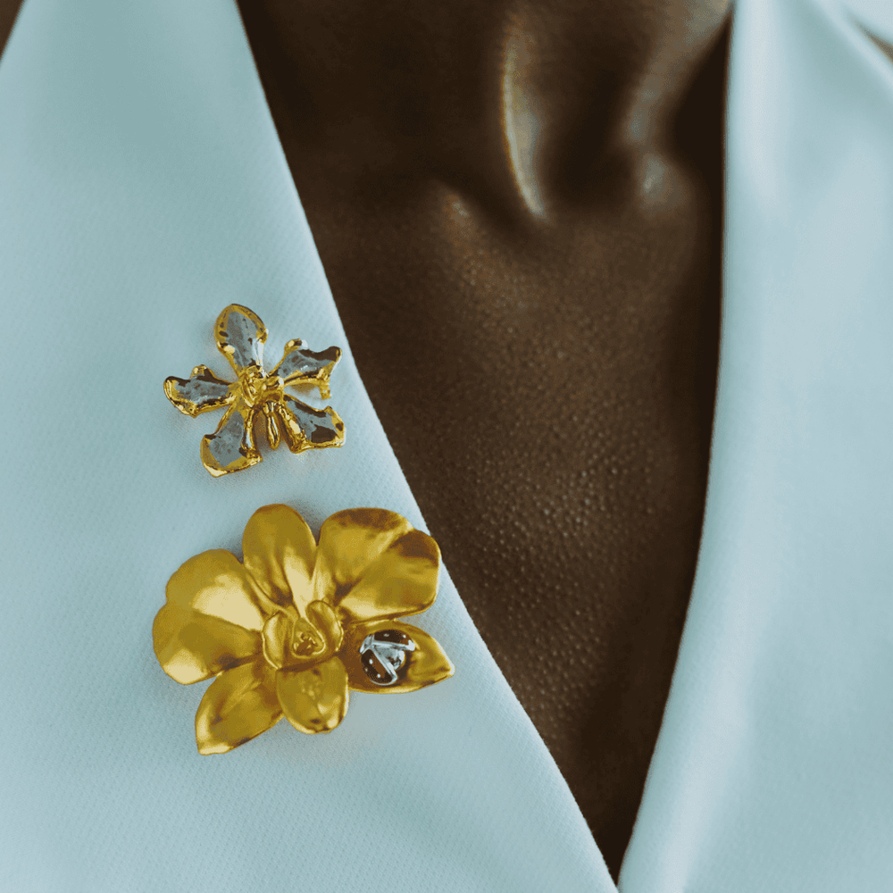 RISIS Wings of Botany Ladybird-on-Orchid Brooch - Natural Dendrobium Eleanor Chan Orchid encapsulated in 24K Swiss Gold