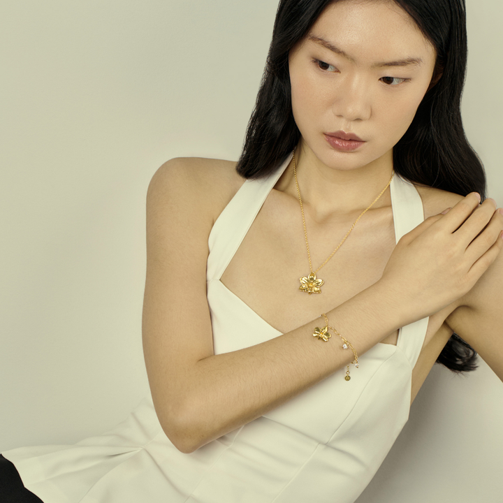 RISIS natural Orchid pendant Necklace in 24K Gold and Orchid Paperclip Bracelet in 24K Gold with Keshi Pearls