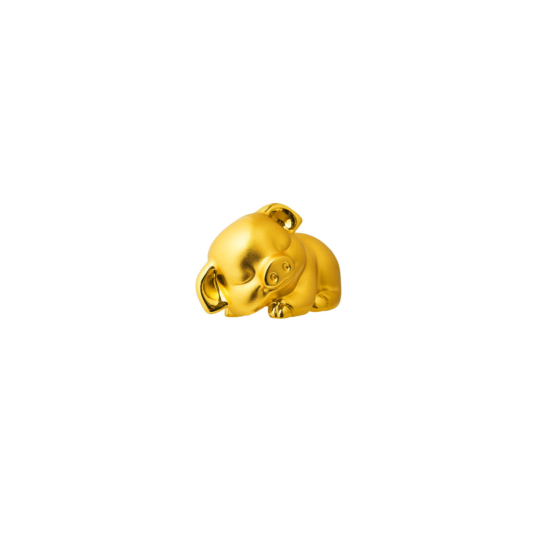 Gold pig figurine, three-quarter view
