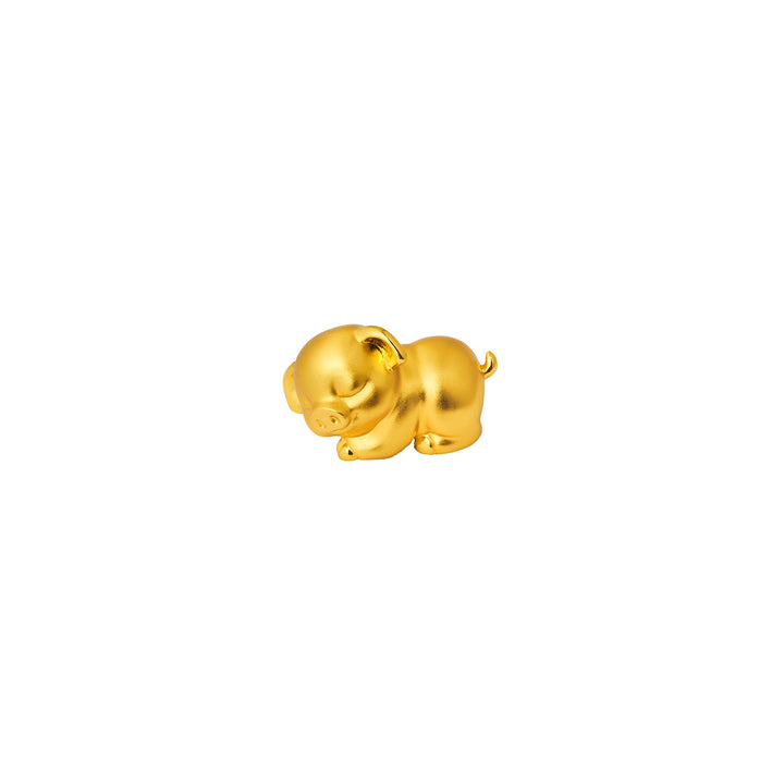 Gold pig figurine, side view