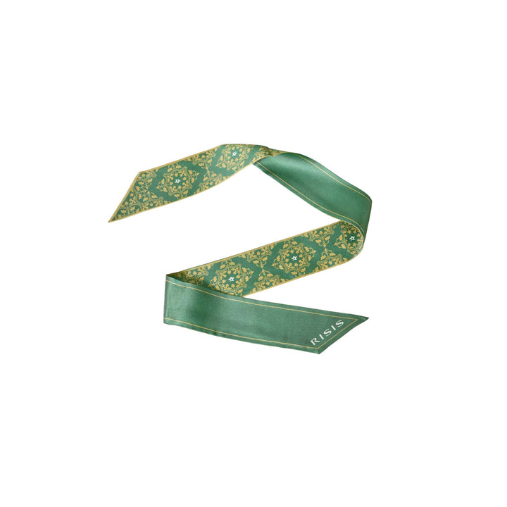 Risis - A green silk ribbon with elegant gold patterning, displaying a smooth texture and a sheen, intricately designed for artistic or fashionable use.