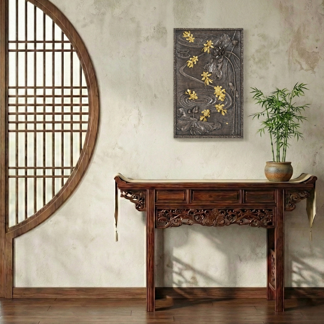 Risis Nine Carp Lotus Frame - A rectangular dark brown panel features a relief of golden koi fish swimming among carved floral elements, creating a striking contrast and dynamic artwork.
