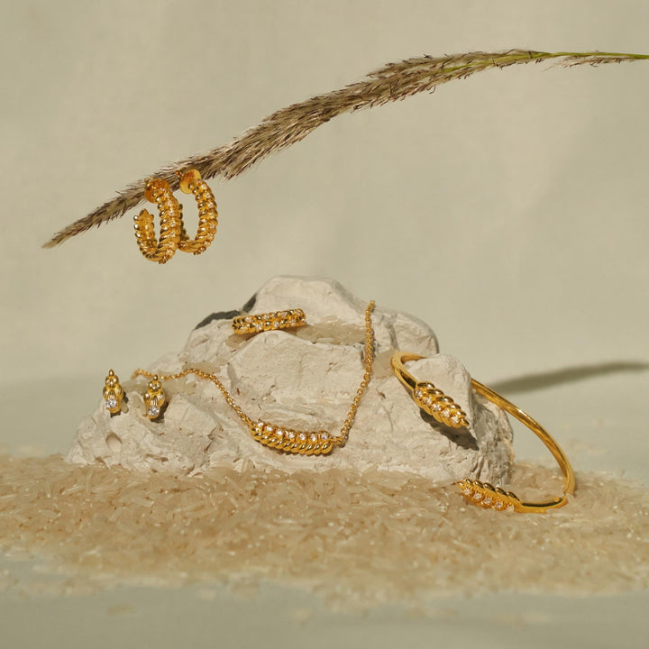Orya Open-Cuff Bangle in Gold with White Topaz