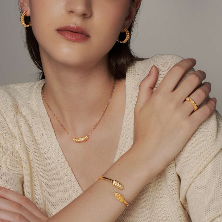 Orya Open-Cuff Bangle in Gold with White Topaz
