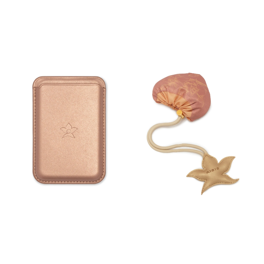 Rose-gold magnetic phone case beside a gathered fabric shopper bag with a cord and star-shaped tag