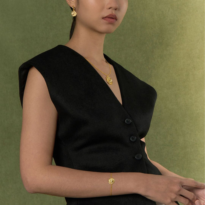 RISIS Athena Pendant Necklace, Earrings and Bracelet, encapsulated in 18K Gold with White Topaz