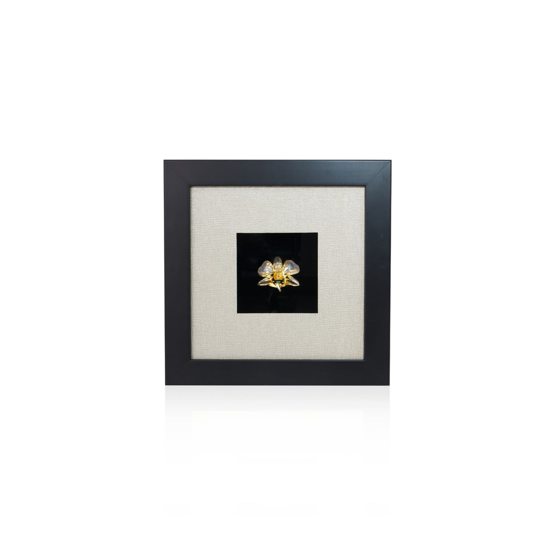 Risis Dendrobium Tay Swee Keng Orchid Frame - A golden flower with crystal petals is centered on a black backdrop within a beige and black frame, displaying elegance and simplicity.