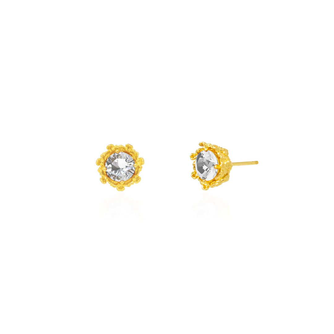 Risis Majestic Vanda Earrings With White Topaz - A pair of round, gold-studded earrings, each featuring a central clear gemstone surrounded by a textured, flower-like rim.
