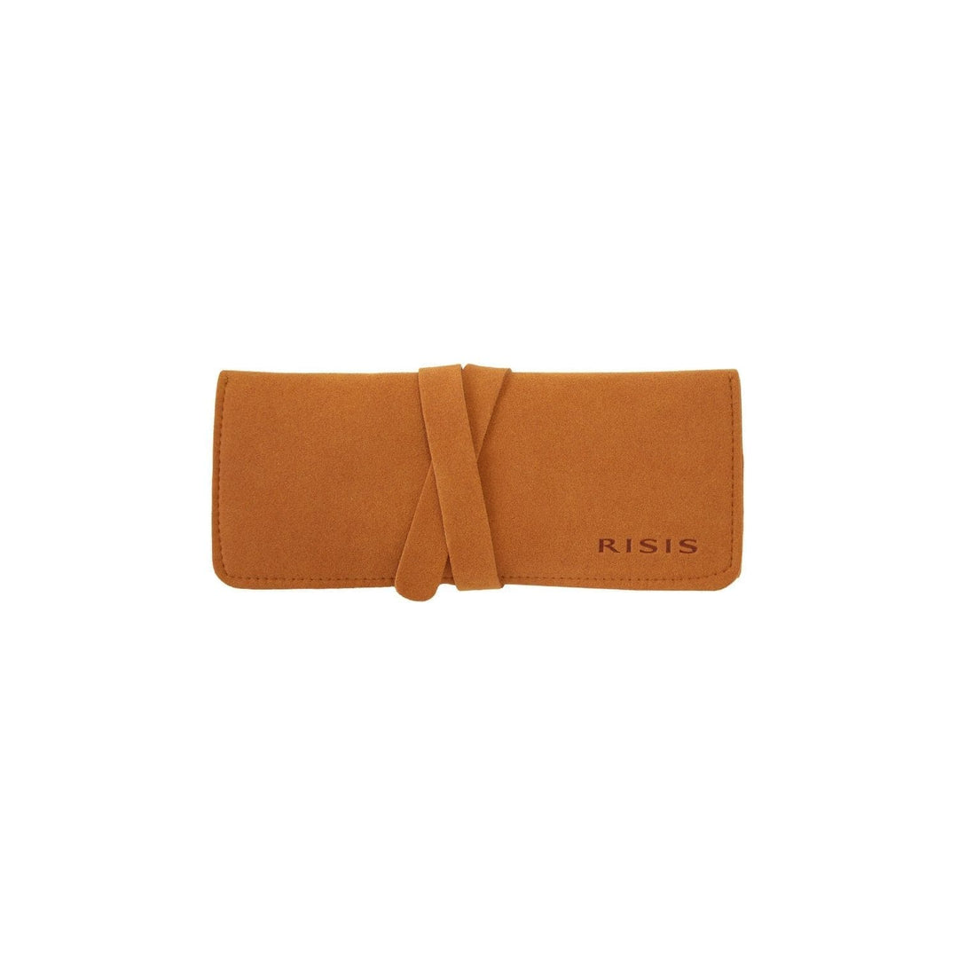 Risis - The image shows a tan-colored suede jewelry pouch with a wrapped closure, bearing the brand name "RISIS" on the lower right corner.