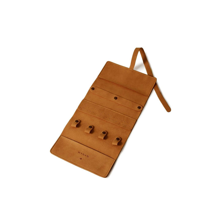 Risis Jewellery Travel Pouch - A tan leather jewelry organizer is displayed, featuring multiple strap loops and pockets for storing various accessories, exuding practicality and simplistic elegance.