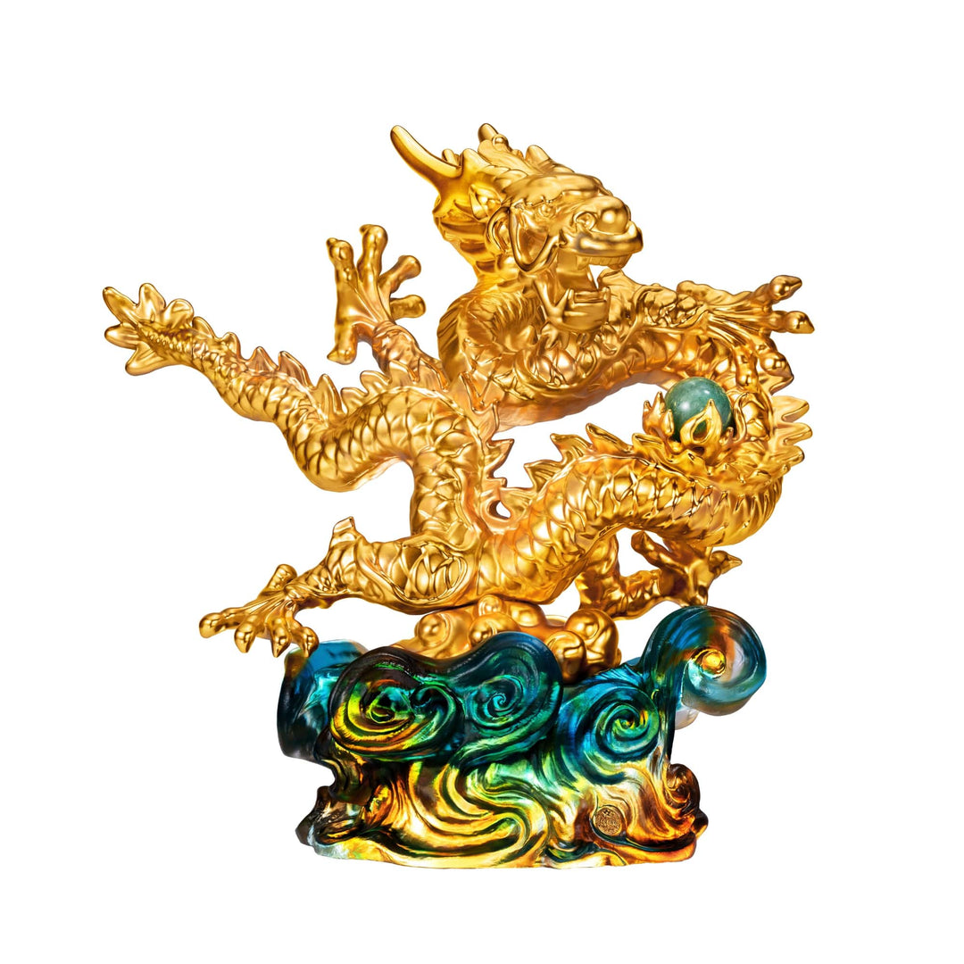Risis The Imperial Dragon on Blue Liu Li - A golden dragon sculpture with intricate scales clutches a pearl, poised atop swirling blue and gold clouds, symbolizing power and luck.