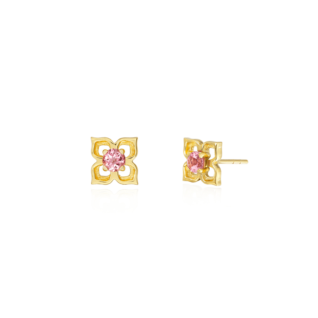 Risis Timeless Peranakan Earrings With Pink Tourmaline - A pair of gold, four-petaled flower-shaped earrings with central pink gemstones, radiating simple elegance.