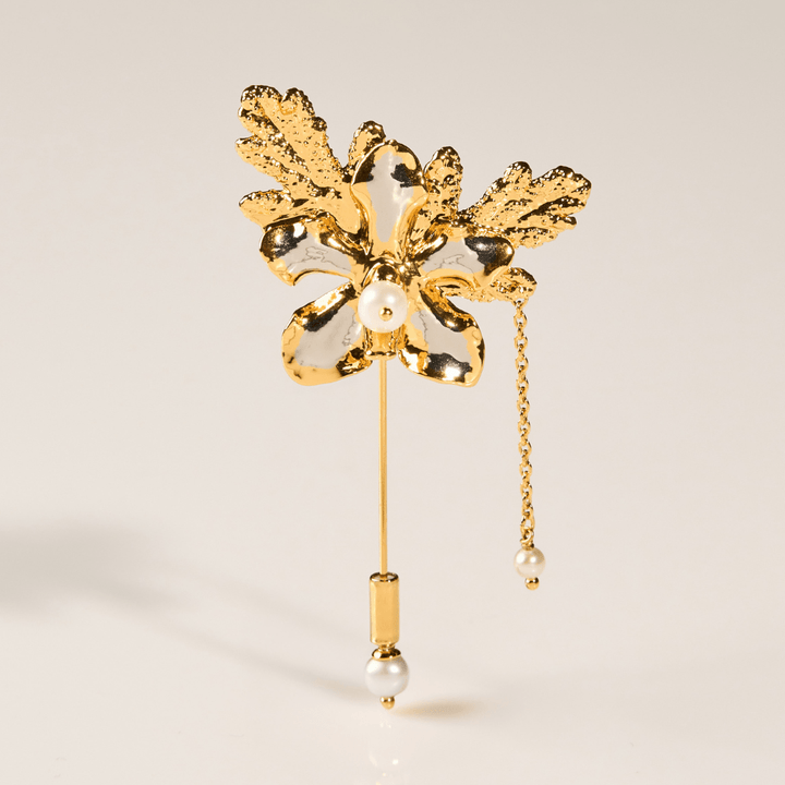 Vanda Limbata Lapel Pin with Citronella Leaves in Gold and Palladium Silver with Freshwater Pearls