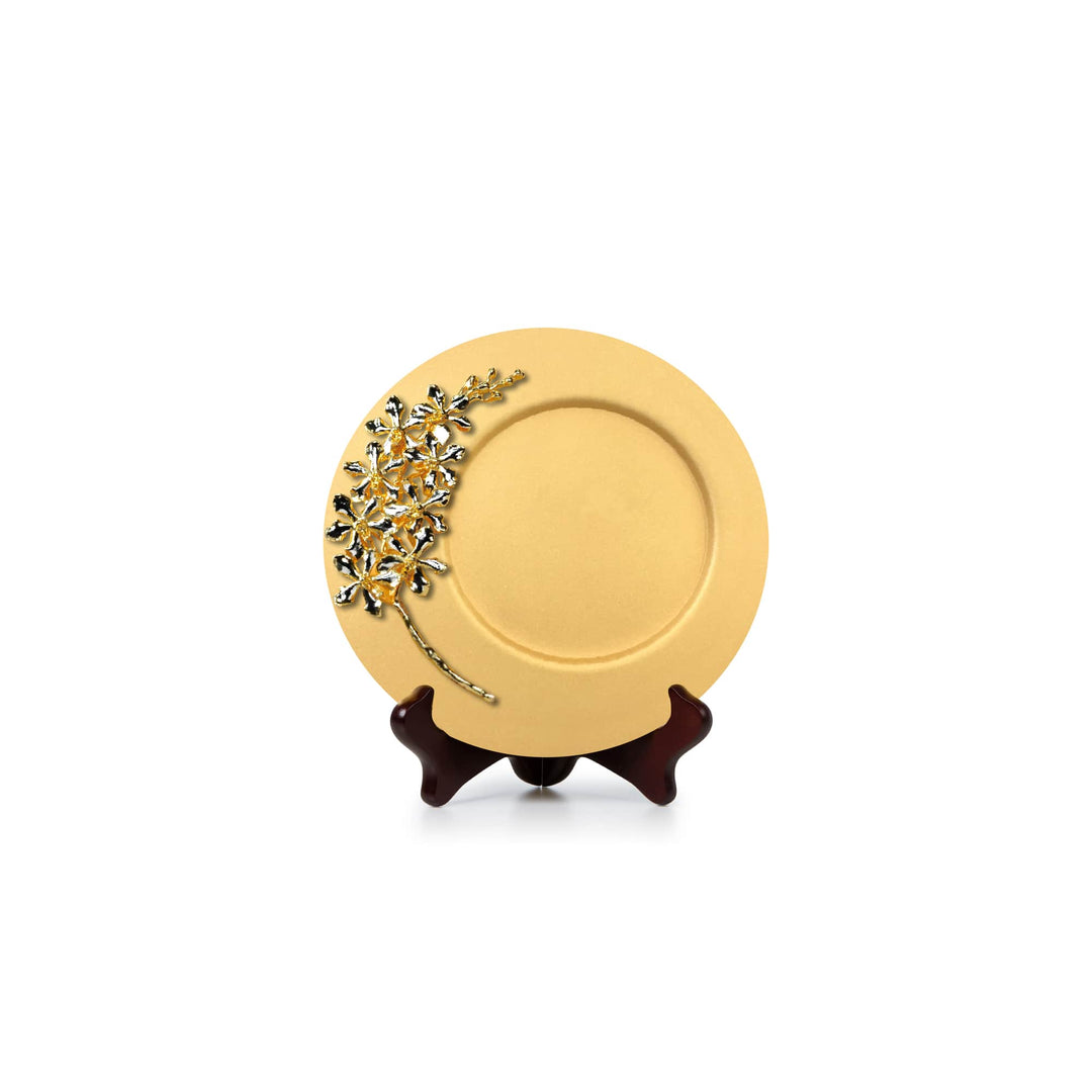 Risis Vanda Limbata Orchid Spray On 8 Inch Plaque Ii - A circular golden plate with embellished crystal floral patterns on its edge, resting on a small brown stand.