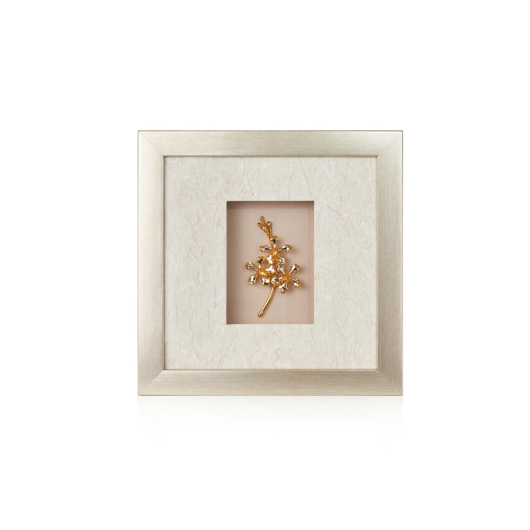 Risis Vanda Wee Kim Lian Orchid Spray Frame - A golden brooch with diamond-like gems is centered within a beige mat, framed by a light wooden square frame, conveying elegance and simplicity.