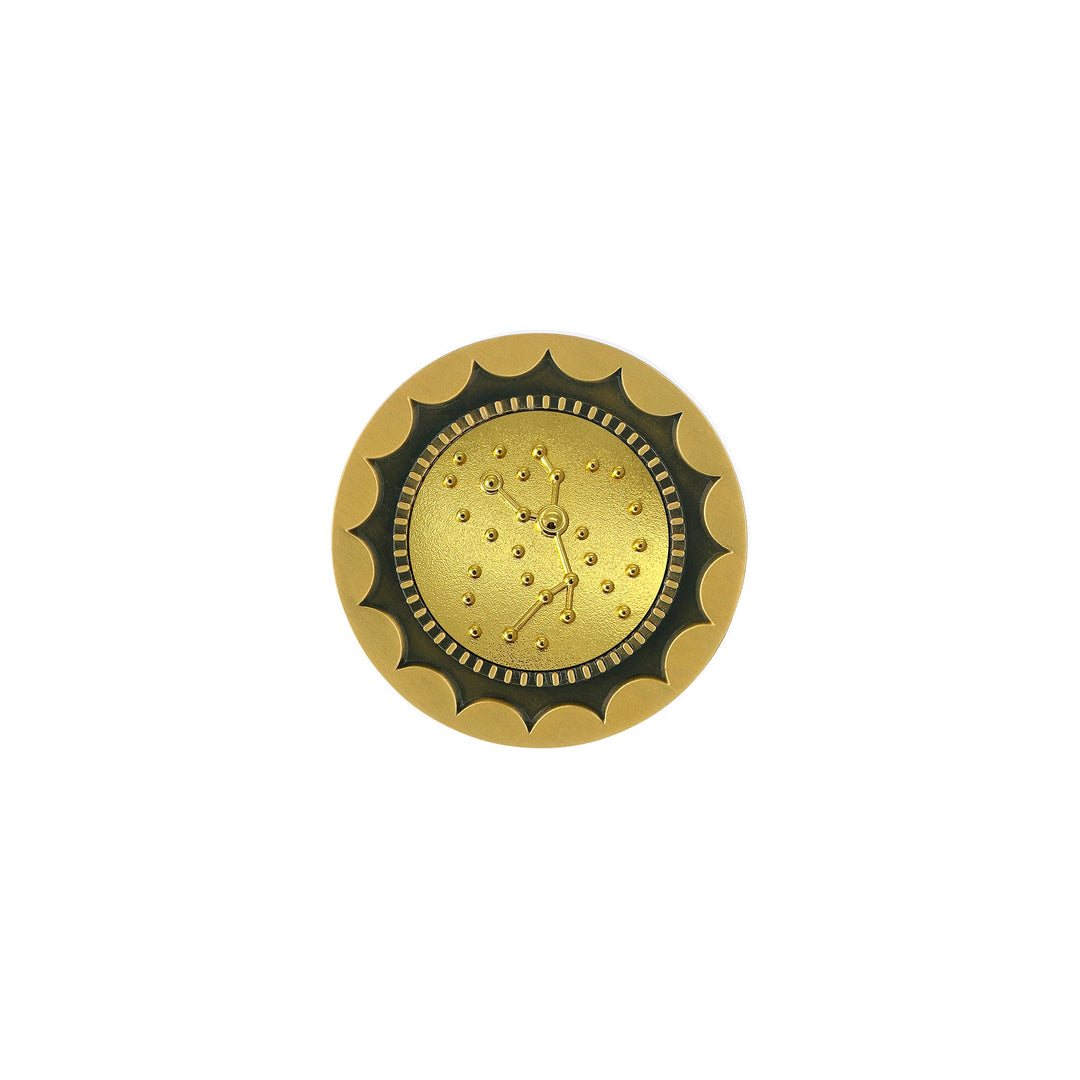 Risis 12 Constellation Base (Virgo) - This is a round golden brooch with a gear-like rim and a textured inner face featuring small reflective dots and central decorative swirl patterns.