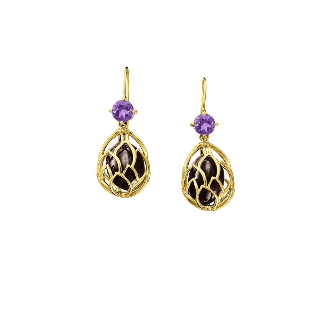 Risis Earrings Lotus Seeds - A pair of gold earrings with intricate lattice designs, featuring a purple gemstone at the top and enclosing multiple smaller garnet-like stones within their cage-like structure.