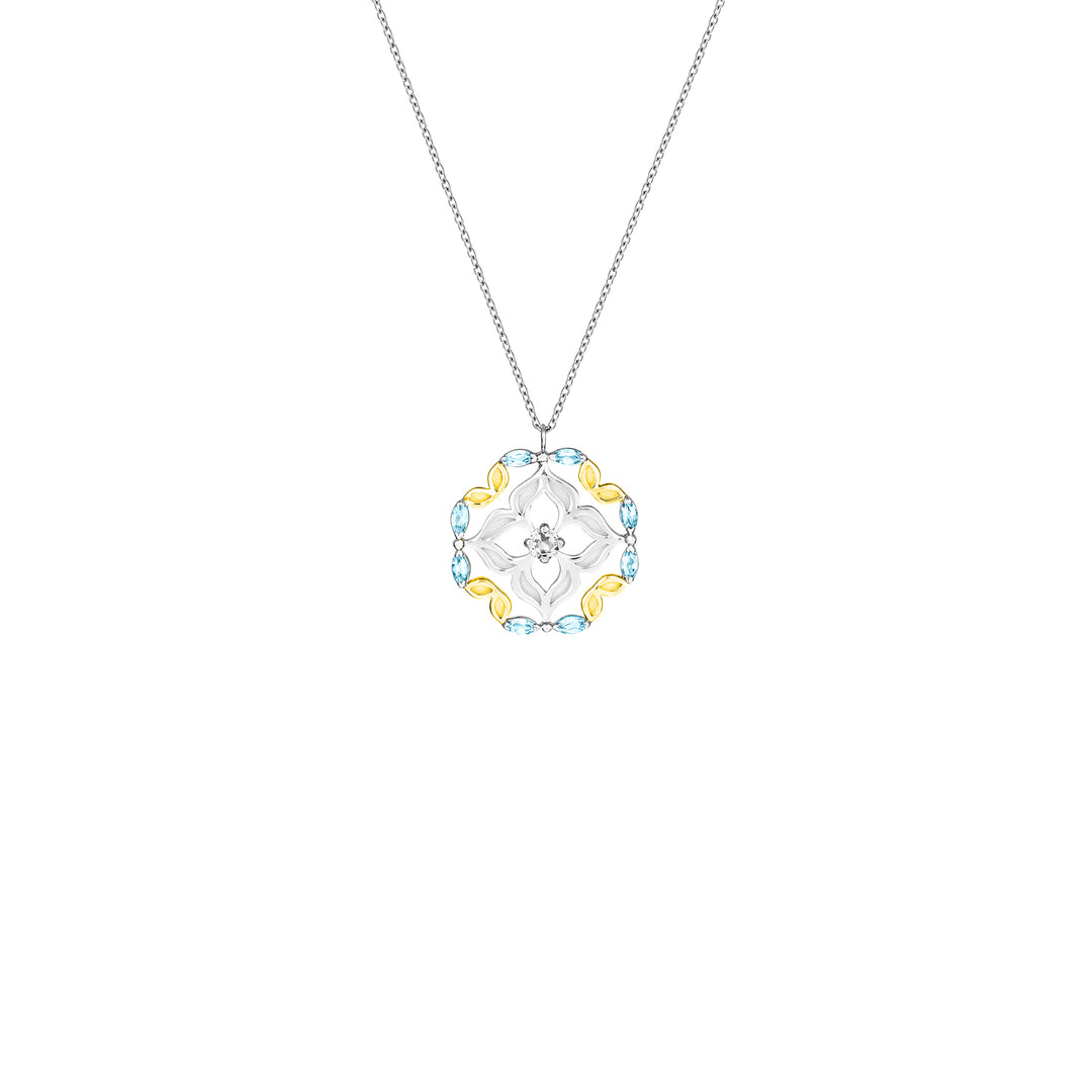 Risis Peranakan Necklace With White Blue Topaz Rh - A silver necklace with a detailed, circular pendant showcasing a symmetrical design with blue and gold accents, creating an elegant and artistic piece of jewelry.