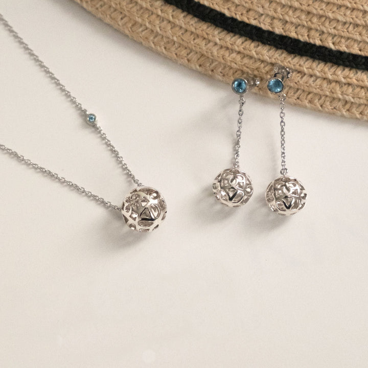 RISIS Peranakan Spheres in Rhodium with Blue Topaz Collection