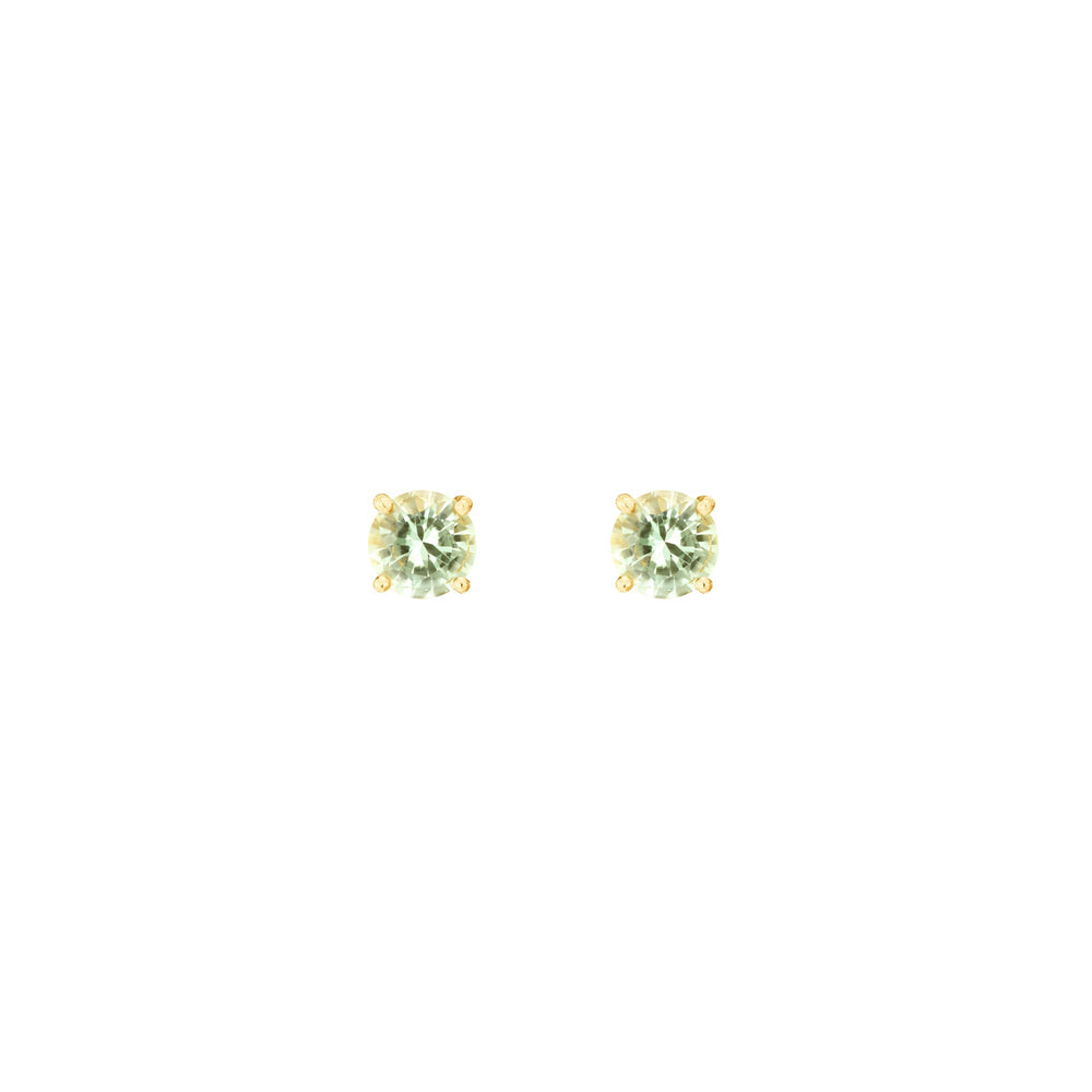 Risis Midori Earrings With Prasiolite - A pair of round-cut, light green gemstone earrings with a golden setting, reflecting light with a subtle sparkle.