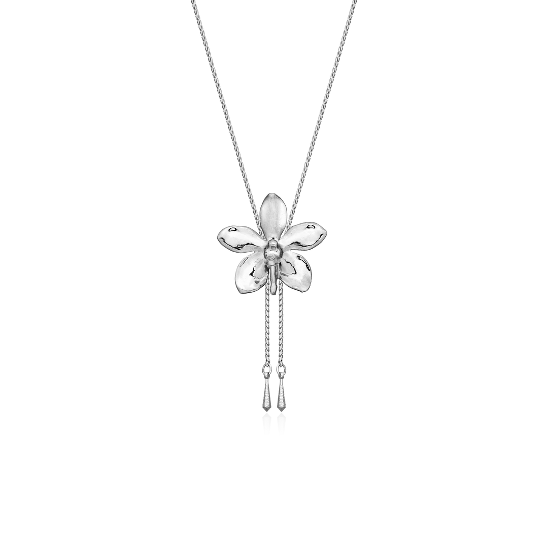 Risis Aeridovanda Vieng Ping Orchid Slider Necklace (P) - A silver necklace with a five-petaled, orchid-shaped pendant featuring a polished finish, accented by two slim tassels hanging from the floral center.