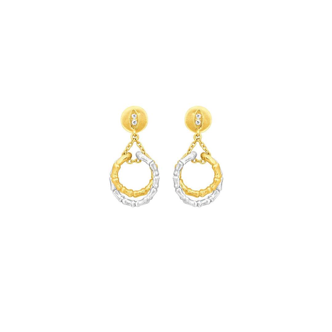 Risis Bamboo Twist Dangling Earrings with White Sapphires - A pair of gold and silver-tone drop earrings with a textured finish and embedded rhinestones, combining elegance and contemporary design.