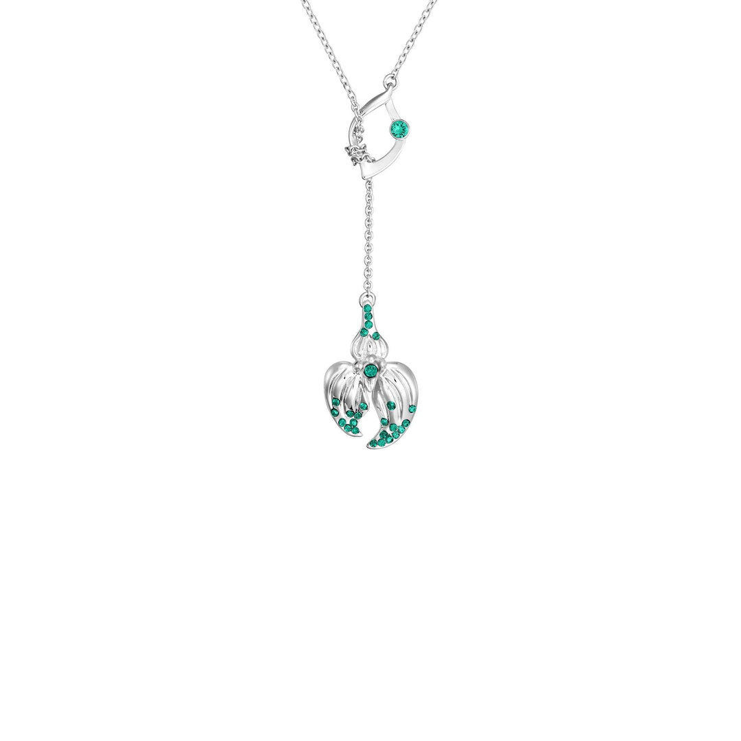 Risis Dazzle With Orchids Necklace - Masdevallia Inspired Orchid with Emerald (May) - A silver pendant showcasing a floral motif is accented with small, vibrant green gemstones, elegantly suspended on a delicate chain.