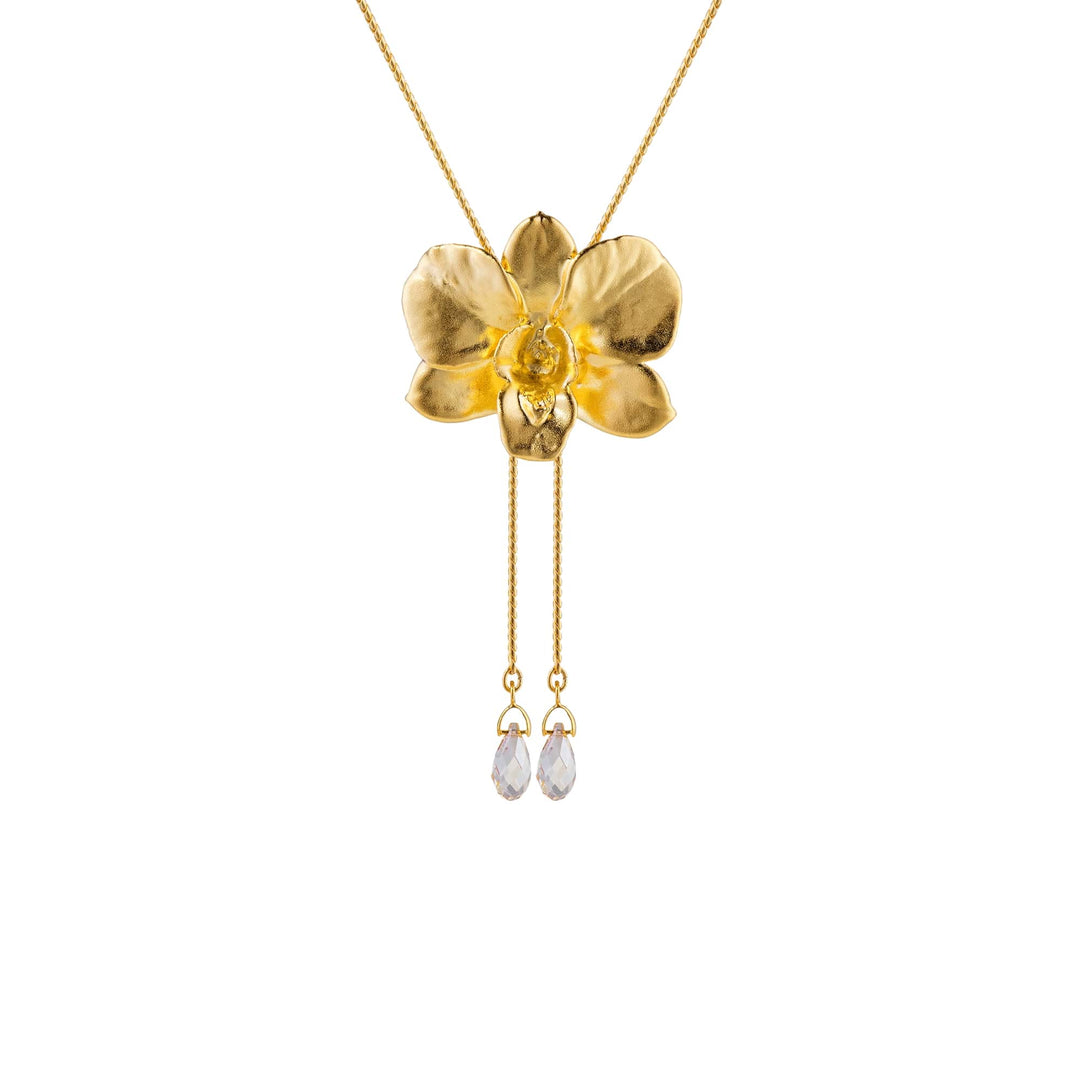Risis Dendrobium Merry Island Orchid Slider Necklace (G) - A golden pendant shaped like a five-petaled flower with a center gem, suspended on a chain, with two teardrop-shaped crystals dangling below on slender links.