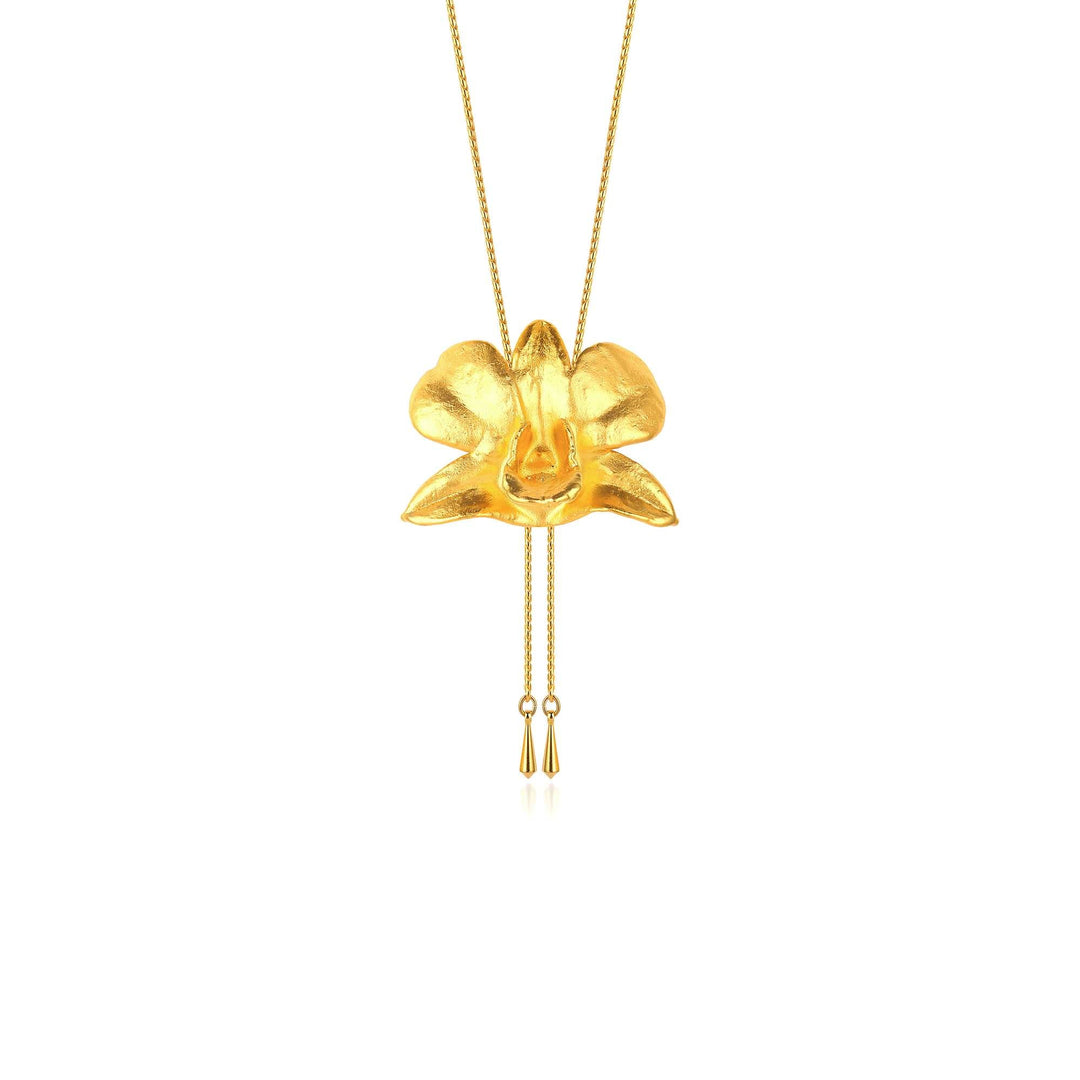 Risis Dendrobium Tay Swee Keng Orchid Slider Necklace (G) - A golden necklace featuring a large, sculpted flower pendant with a lustrous finish and delicate, hanging tassel accents.