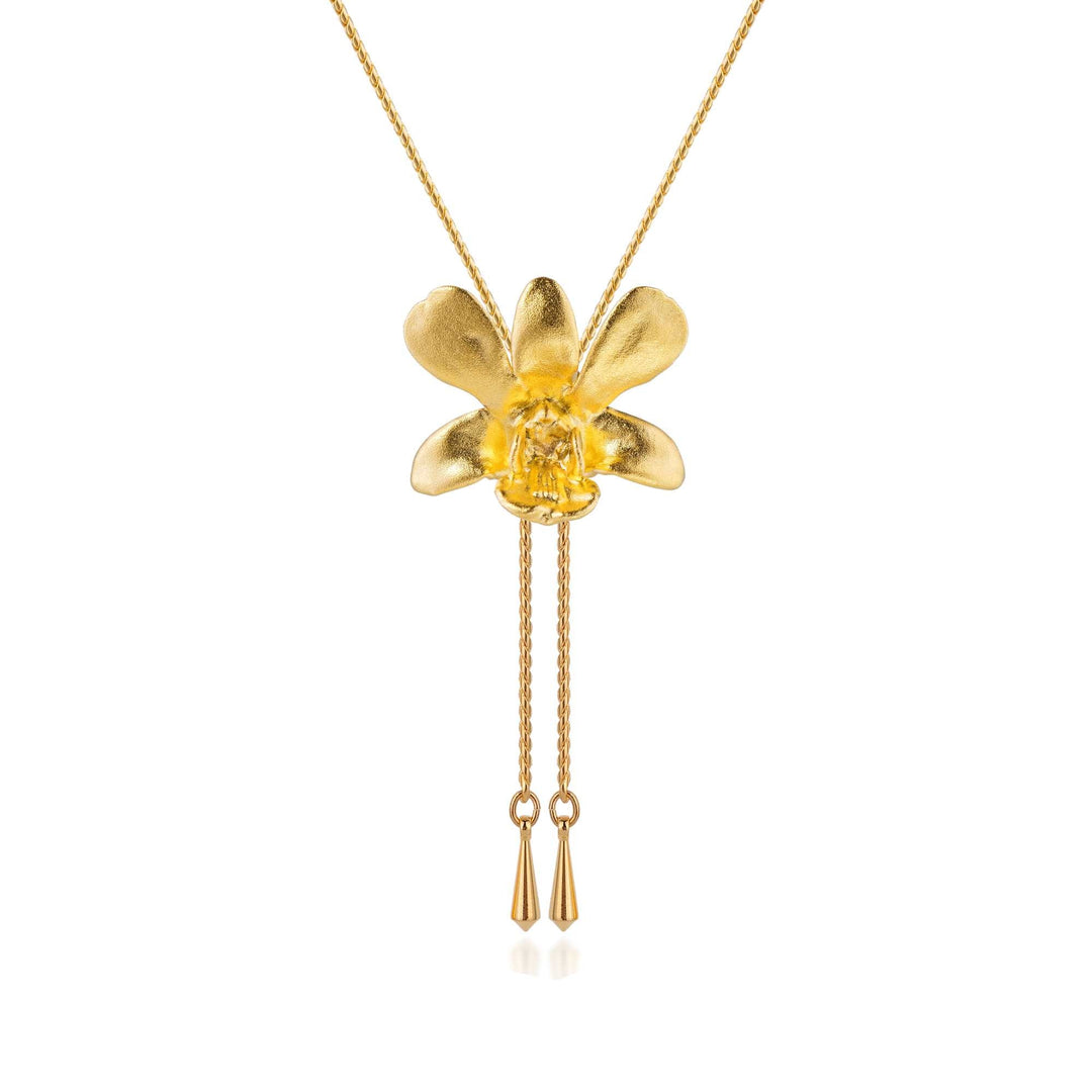 Risis Dendrobium Thong Chai Orchid Slider Necklace (G) - A golden necklace with a five-petaled flower pendant, featuring a translucent yellow center and two dangling chain tassels terminating in conical shapes.