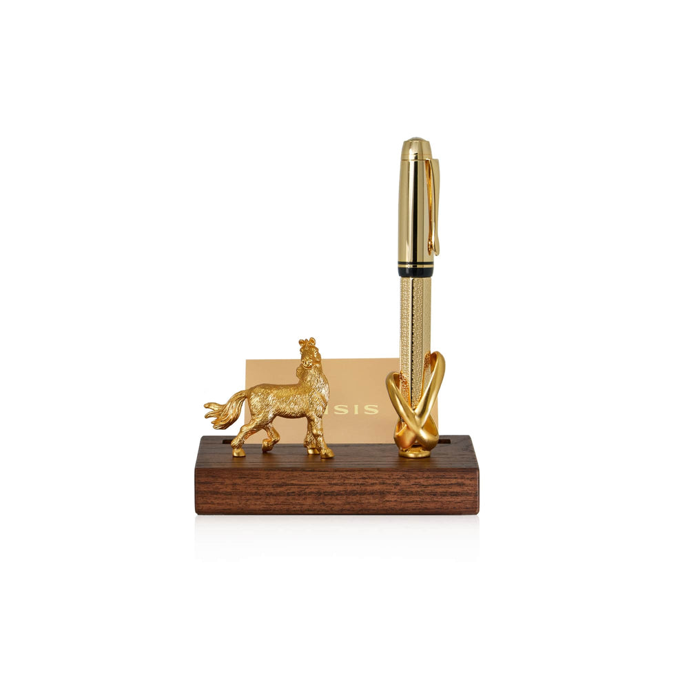 Risis Horse Infinity Pen And Name Card Holder - A golden pen stands between a golden miniature horse and a heart sculpture, all resting on a polished wooden base with an engraved plaque.