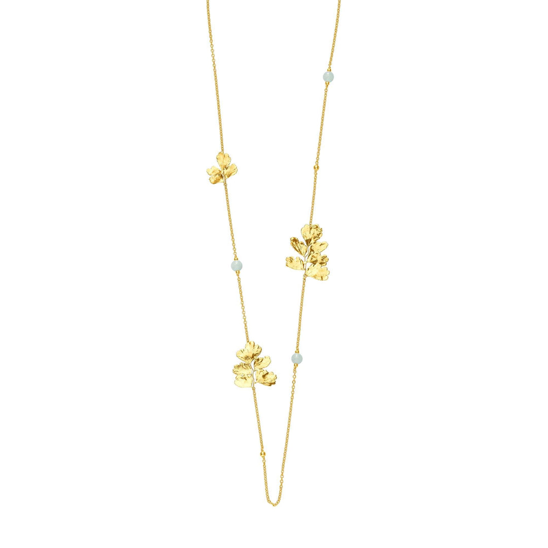Risis Maiden Jade Long Necklace - A golden necklace with delicate leaves and pale blue beads displayed in a hanging position, creating an elegant, botanical aesthetic.