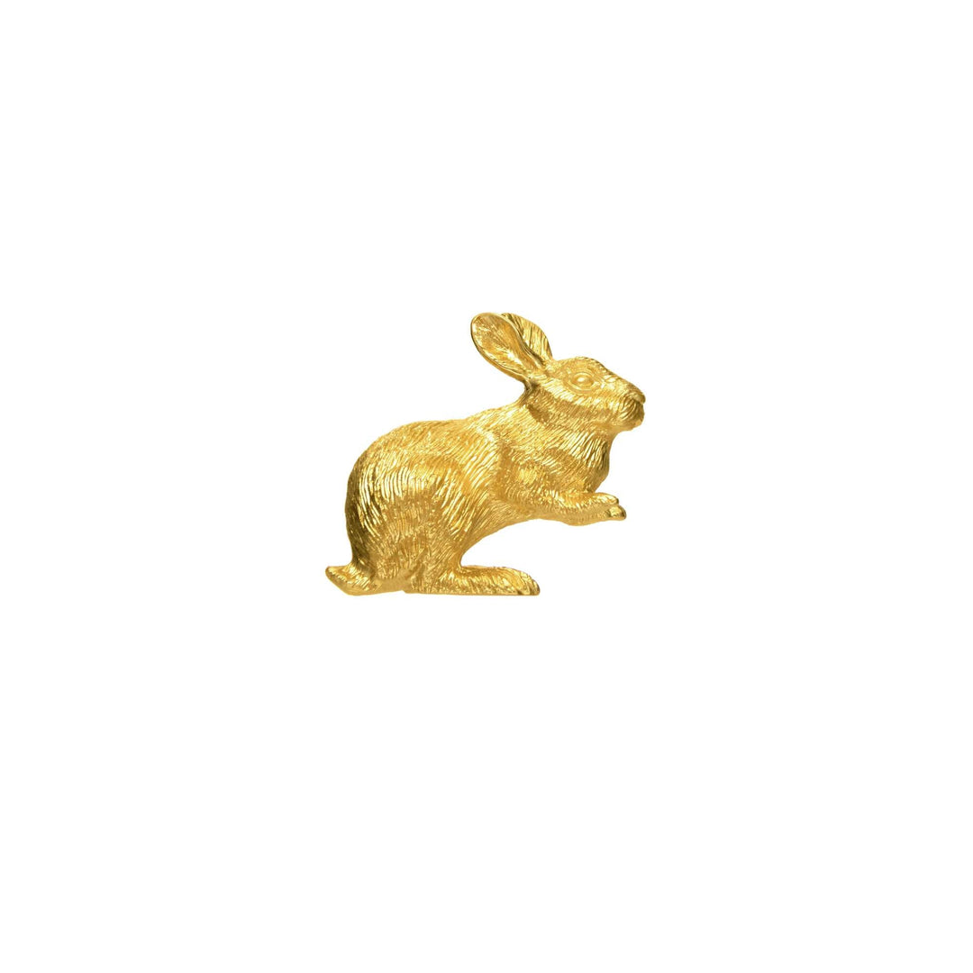 Risis Mini Orientals - Rabbit - A golden rabbit figurine, textured and detailed, appears mid-hop, capturing the essence of motion. Its metallic sheen highlights its form and features.