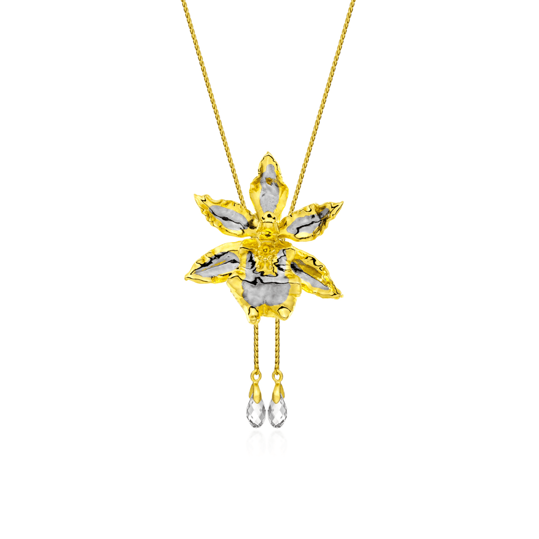 Risis Oncidium Wildcat Orchid Slider Necklace with Crystal Tailends (PG) - A yellow gold pendant shaped like a stylized flower with contrasting white and grey patterns, featuring two hanging teardrop gemstones, suspended on a delicate chain.