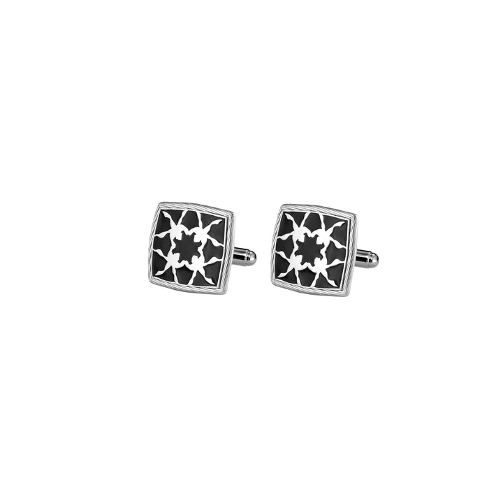 Risis Peranakan Orchid with Black Enamel Cufflinks - A pair of square cufflinks with an intricate black and white floral design, featuring polished silver edges.