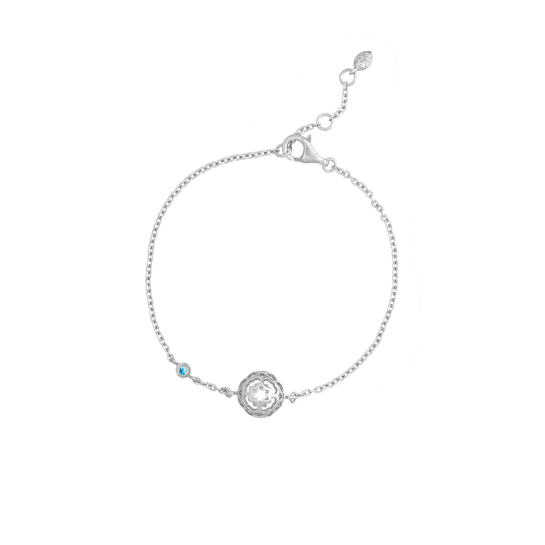 Risis Peranakan Spheres Bracelet with Blue Topaz (RH) - A delicate silver bracelet with a central ornate charm and a small blue gemstone, exuding elegance and simplicity.