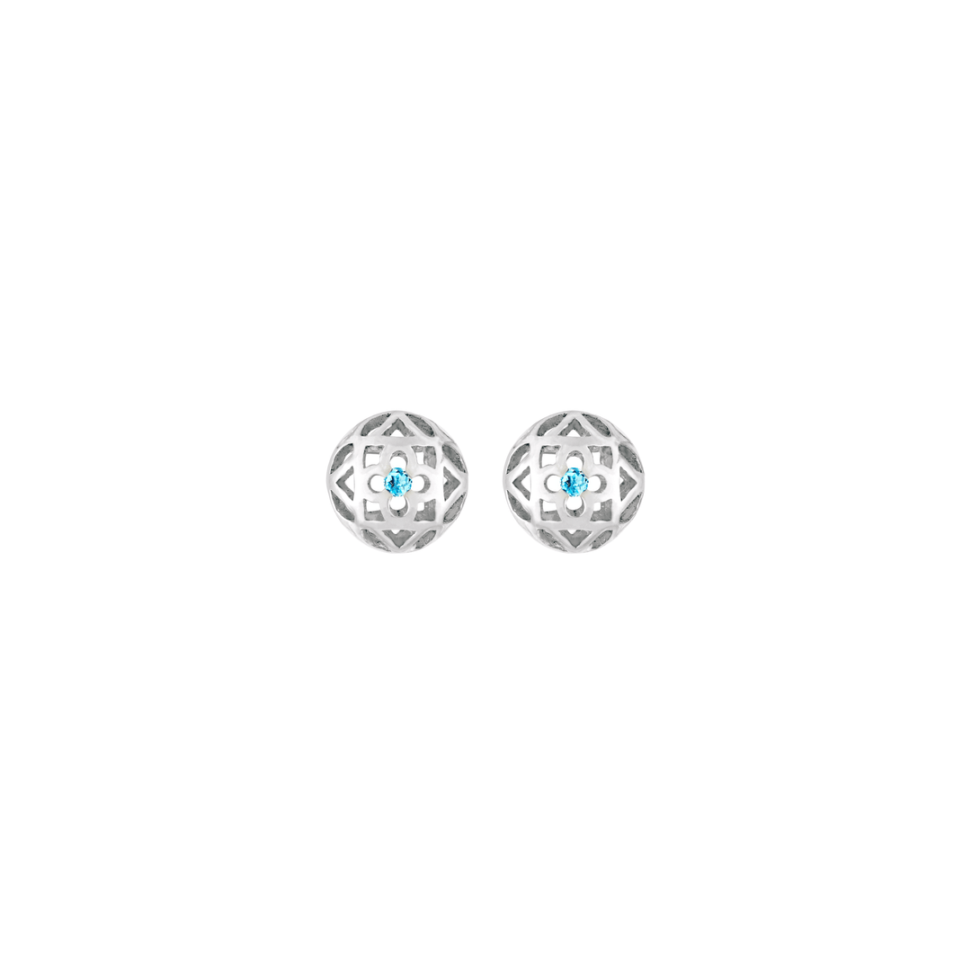 Risis Peranakan Spheres Pierced Earrings with Blue Topaz (RH) - A pair of silver earrings with intricate geometric cutouts, each centered with a small, pale blue gemstone.