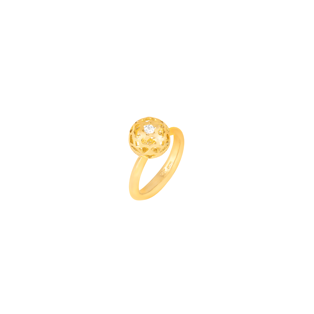 Risis Peranakan Spheres Small Ring with White Topaz (G) - A golden ring with a textured sphere embellished with a sparkling stone at the center, capturing light and radiance.