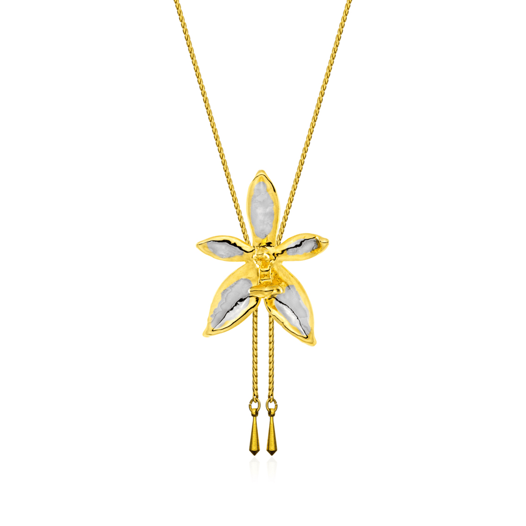 Risis Phalaenopsis Cornu Cervi Orchid Slider Necklace (PG) - An elegant gold necklace with a pendant shaped like a stylized flower, featuring translucent petals, likely mother-of-pearl, with gold trim and two dangling gold tassels.
